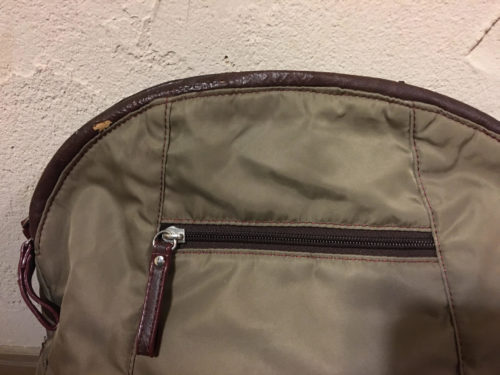 An enlarged image of the faux leather part to be repaired.