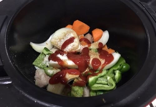 Image: Add the microwaved vegetables and seasonings.