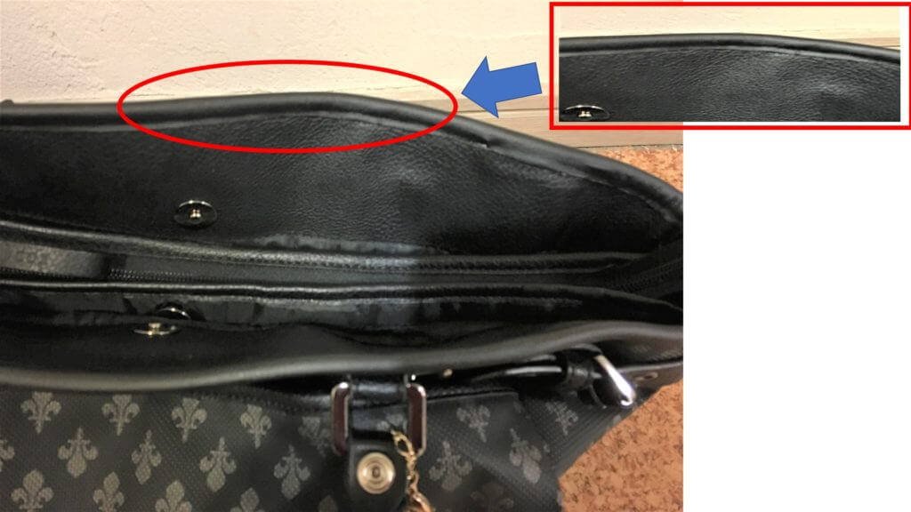 An enlarged image of the faux leather part to be repaired.